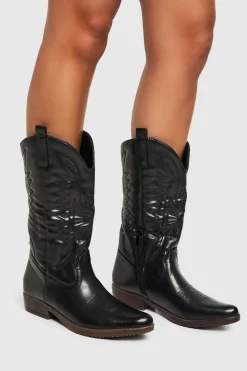 Cowgirl^Nasty Gal Contrast Sole Calf High Western Boots |