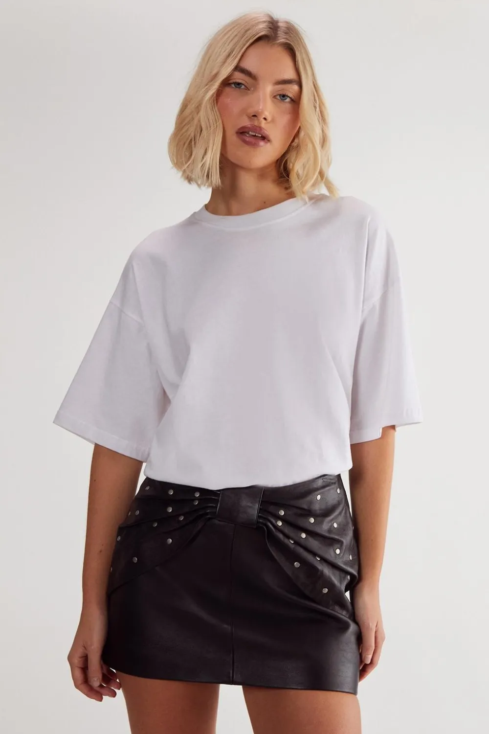 Leather|Skirts^Nasty Gal Studded Bow Detail Leather Mini Skirt |